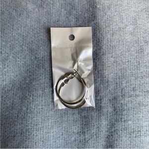 Small hoop earrings in silver color